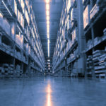 Huge,Product,Warehouse,With,Tall,Shelves,And,Lots,Of,Boxes